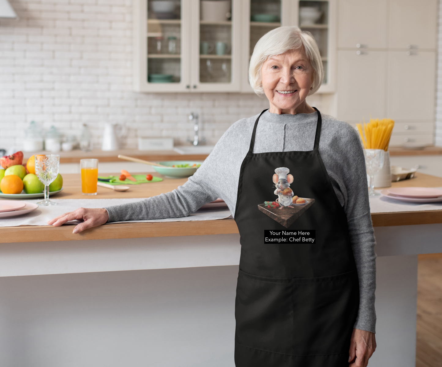 Women wearing an apron with a Mouse Chef. Personalized
