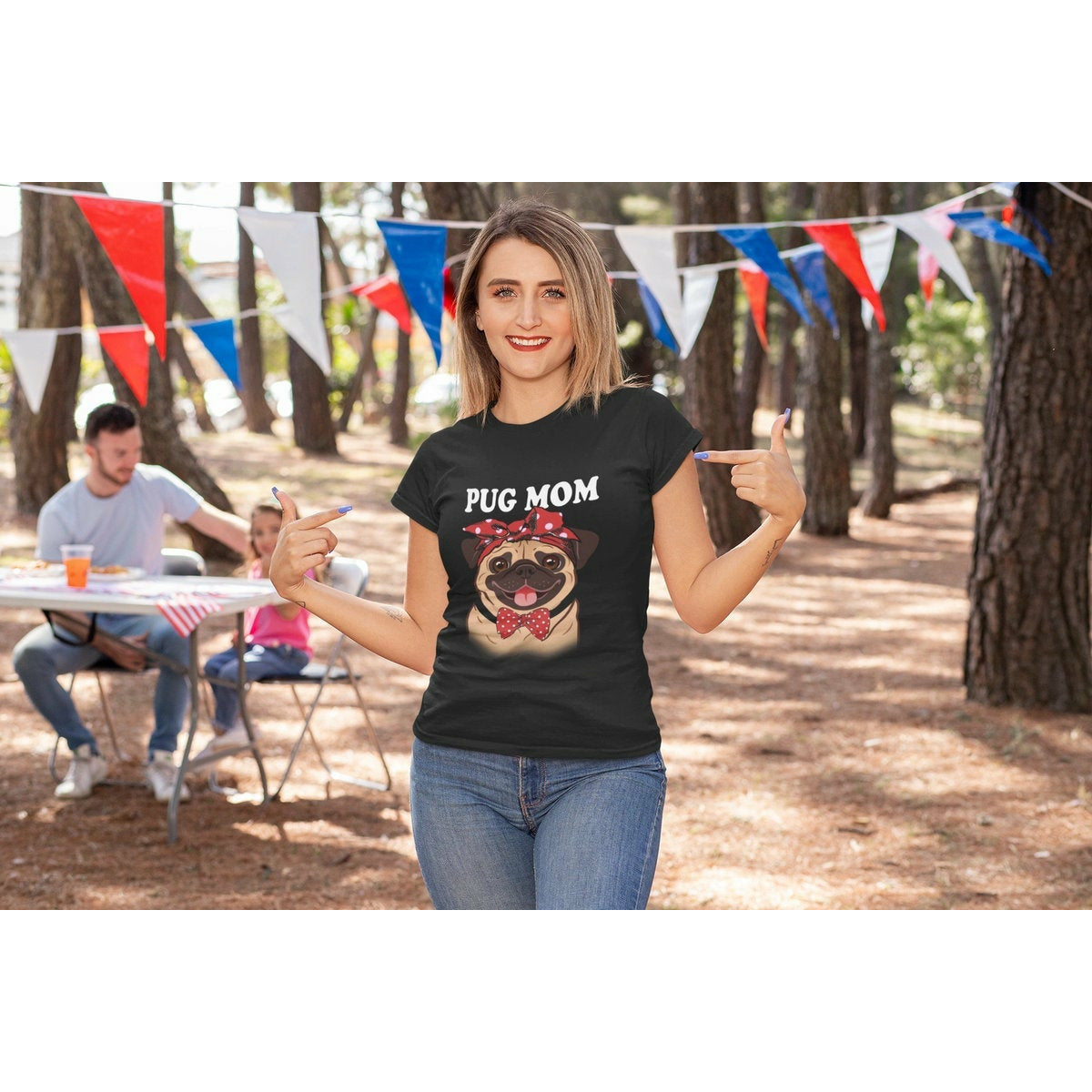 Girl wearing a Tee with a Cartoon Pug & the words Pug Mom.
