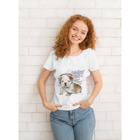 Girl wearing a Tee shirt with a Bulldog Puppy. The puppy is wearing headphones with Rhinestones. The shirt says "Rockin Out to my Own Beat," also in Rhinestones.