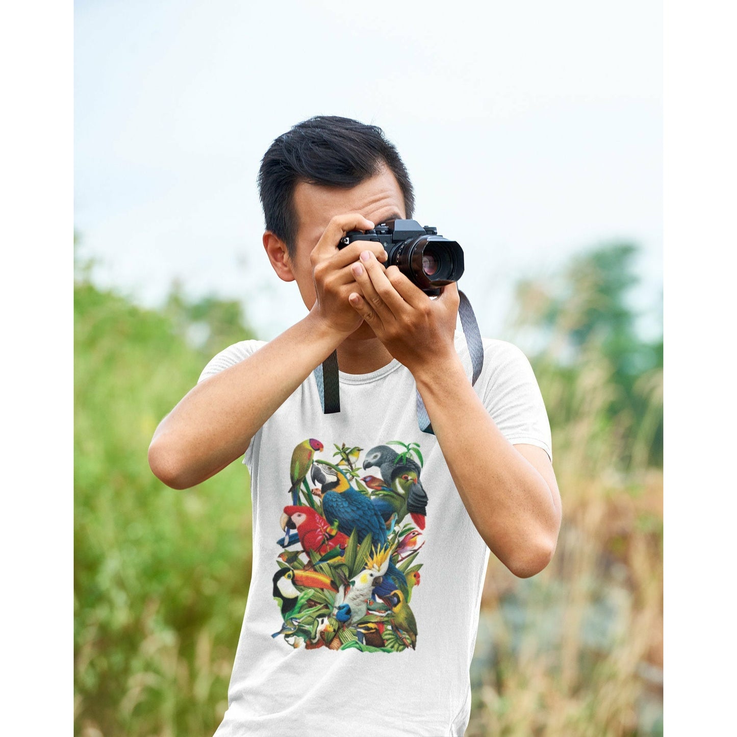 Man with a Camera wearing a Solar Tee Shirt 